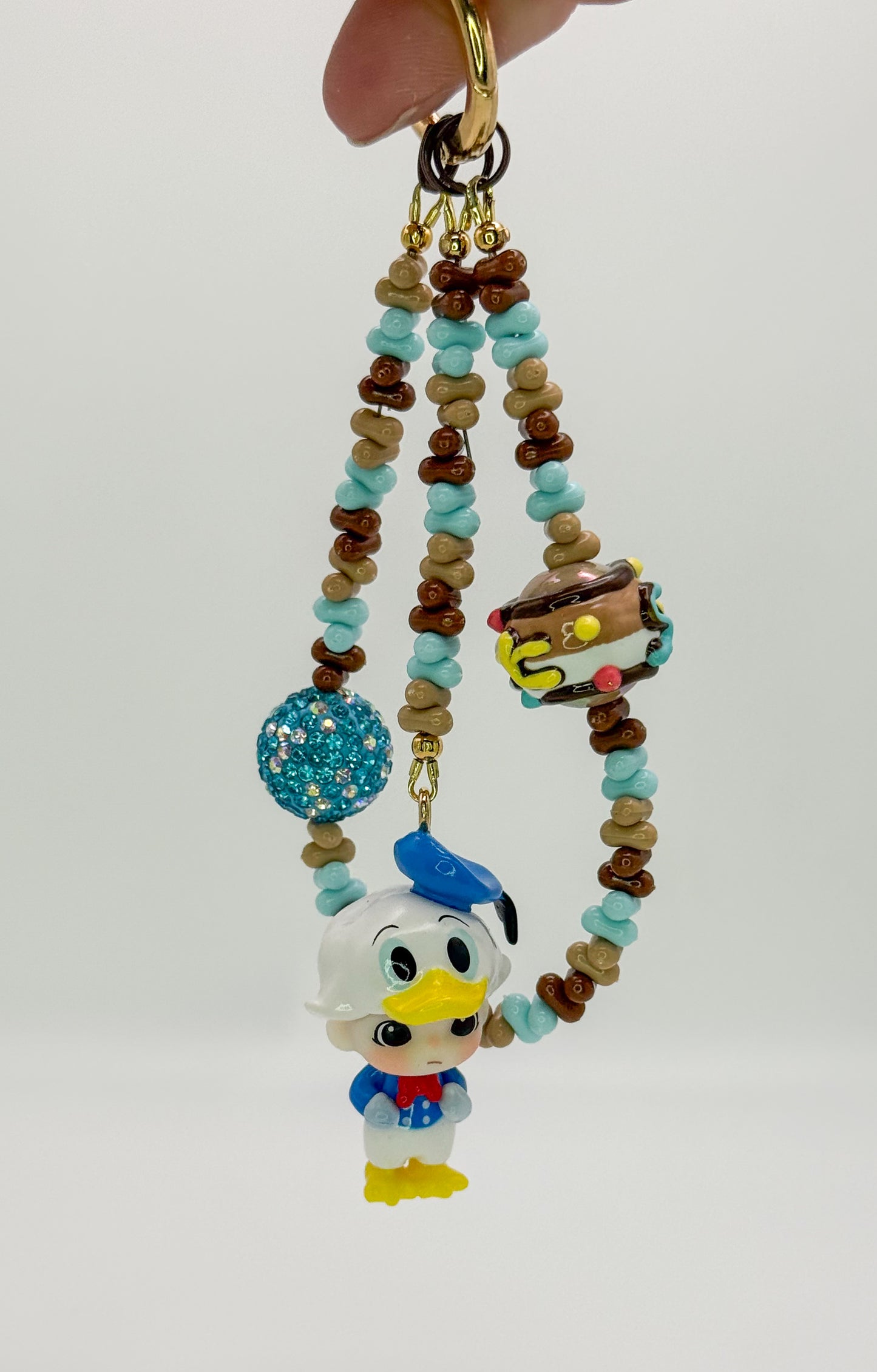Popmart’s Dimoo Donald Duck dressed up Key Charm Key Chain