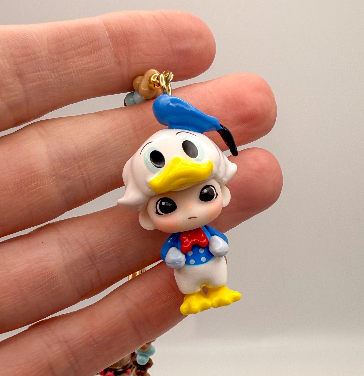 Popmart’s Dimoo Donald Duck dressed up Key Charm Key Chain