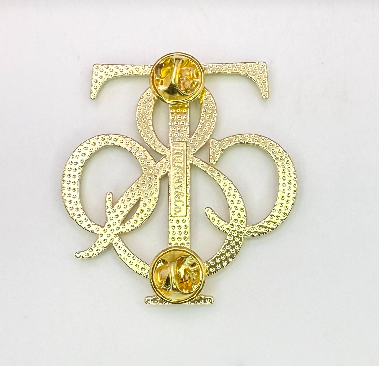 Tiff n Co. Brooches-Silver or Gold
