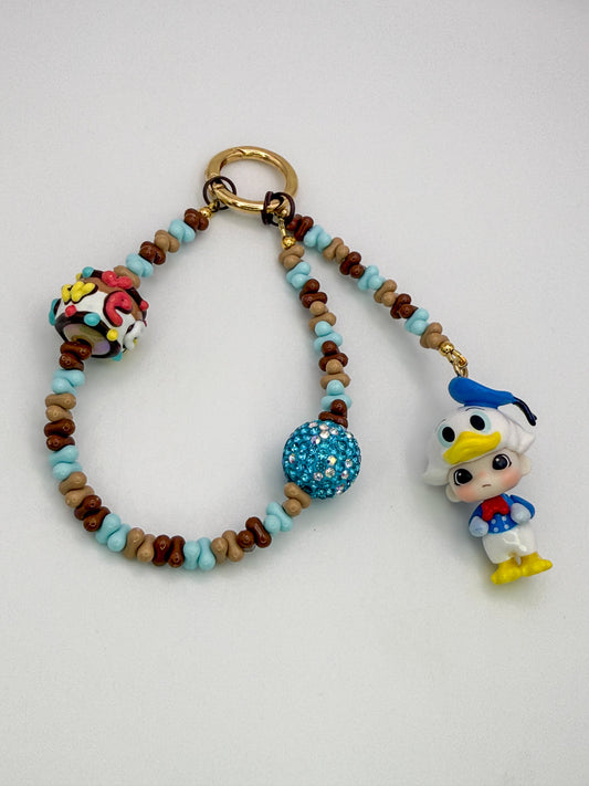 Popmart’s Dimoo Donald Duck dressed up Key Charm Key Chain