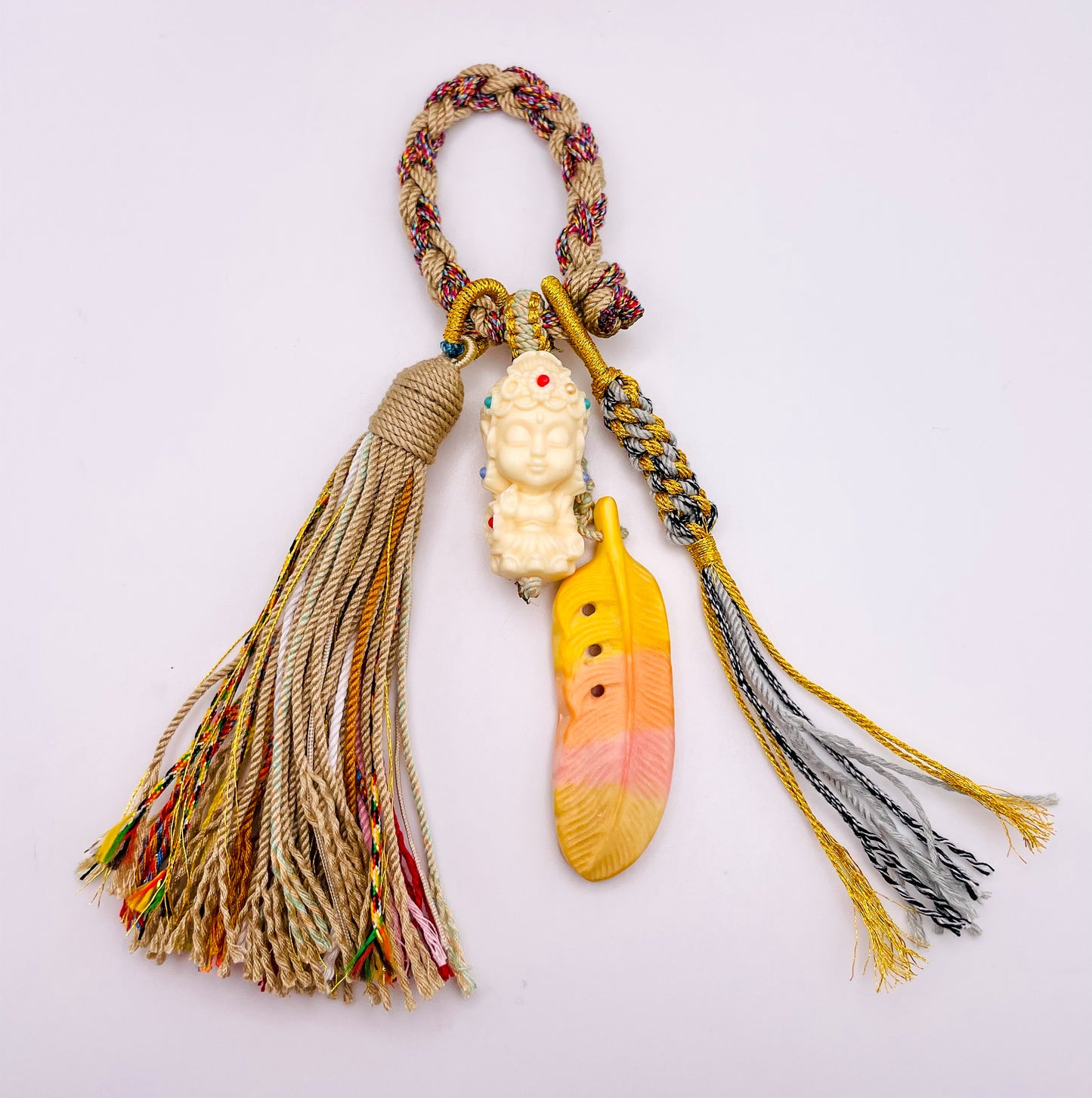 Ivory Nut Budda Carving with Feather on Handmade Tassel Keychain