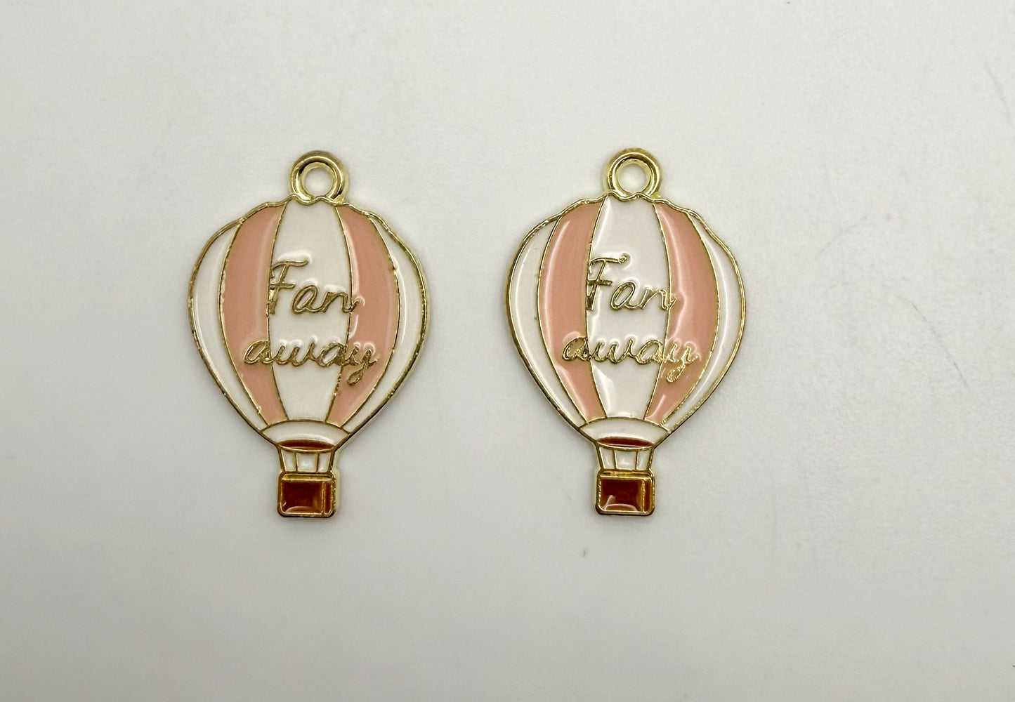 Gold Hot Air Balloon Metal Charm with saying ‘Far Away’