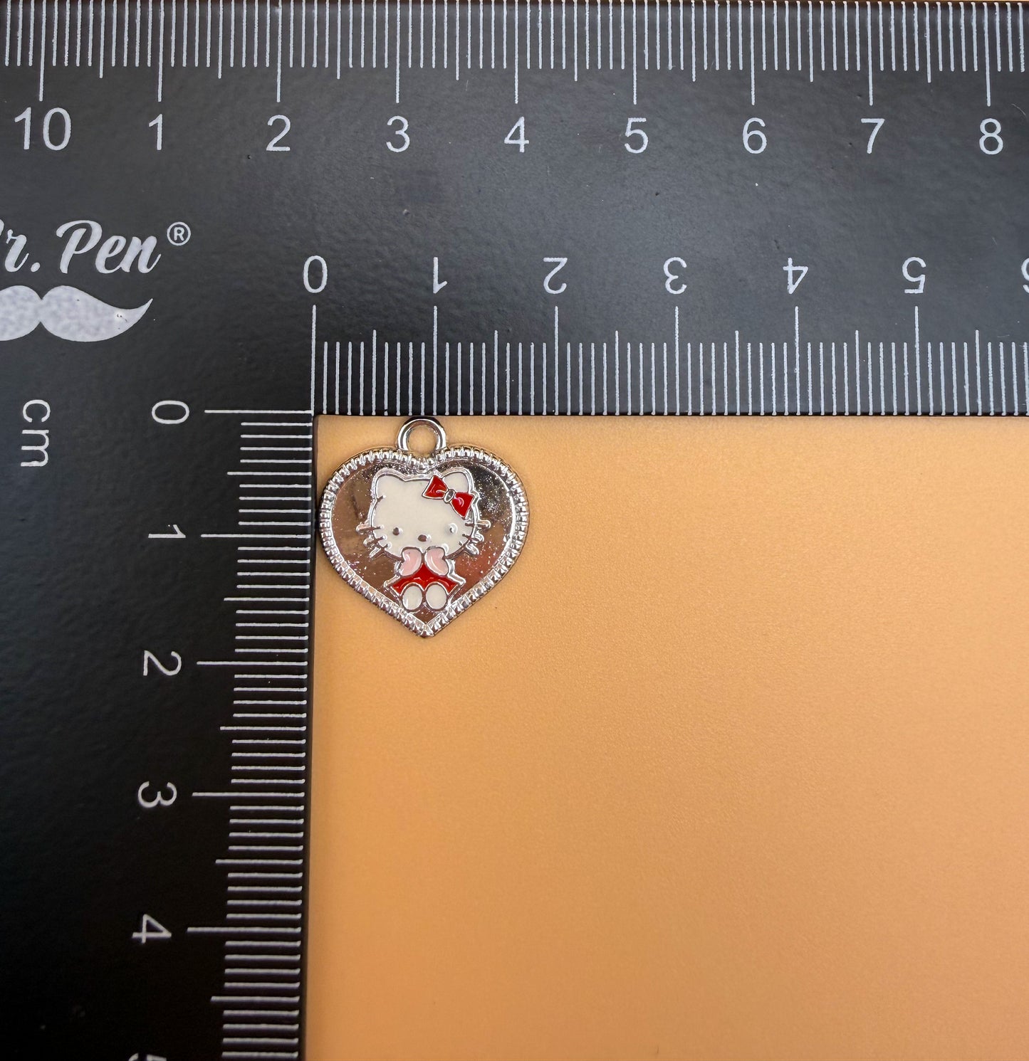 Variety of Gold & Silver Hello Kitty Metal Charms