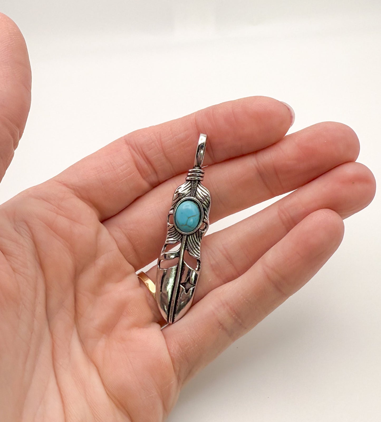 Silver Feather Pendant with Turquoise Stone in Center