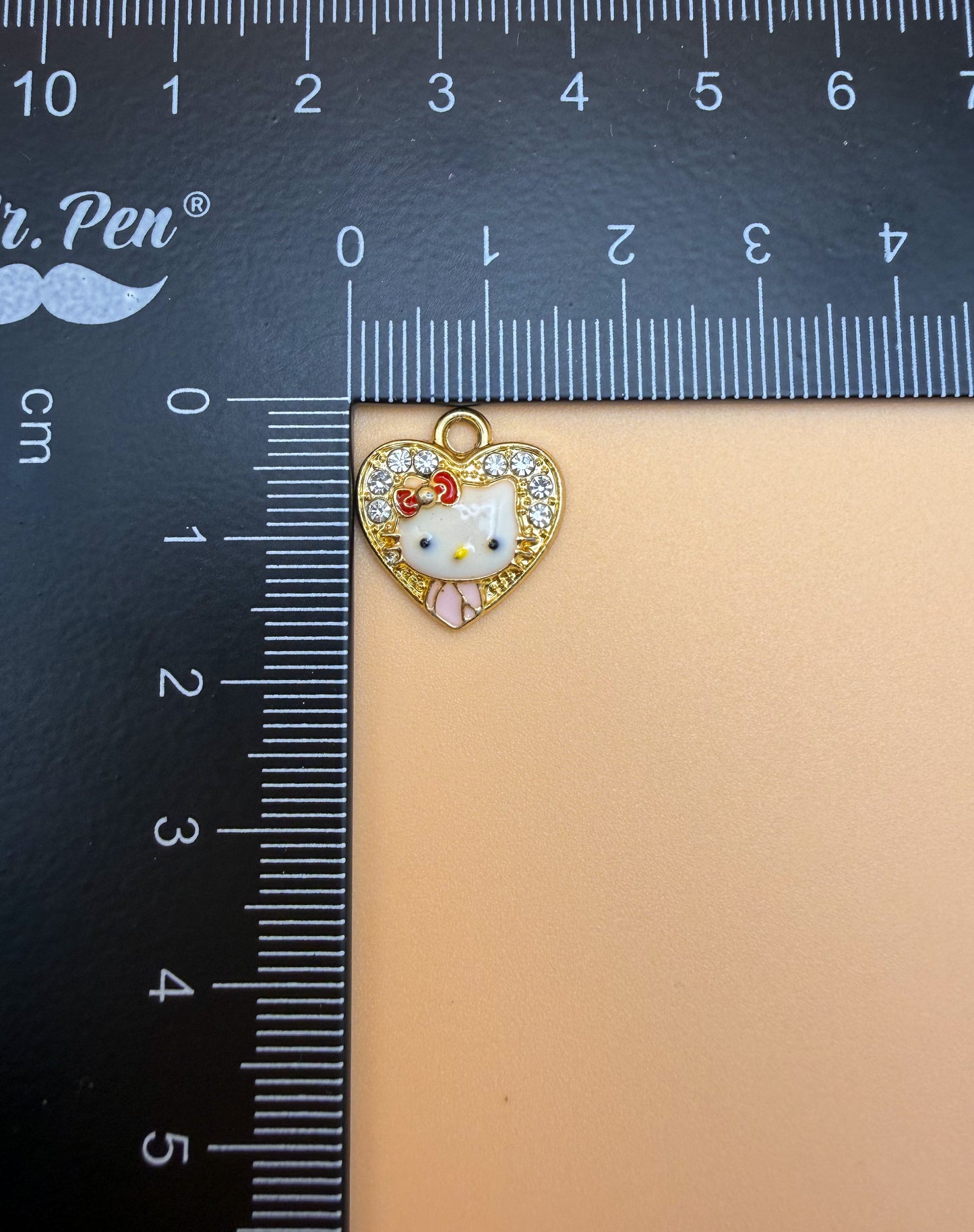 Variety of Gold & Silver Hello Kitty Metal Charms