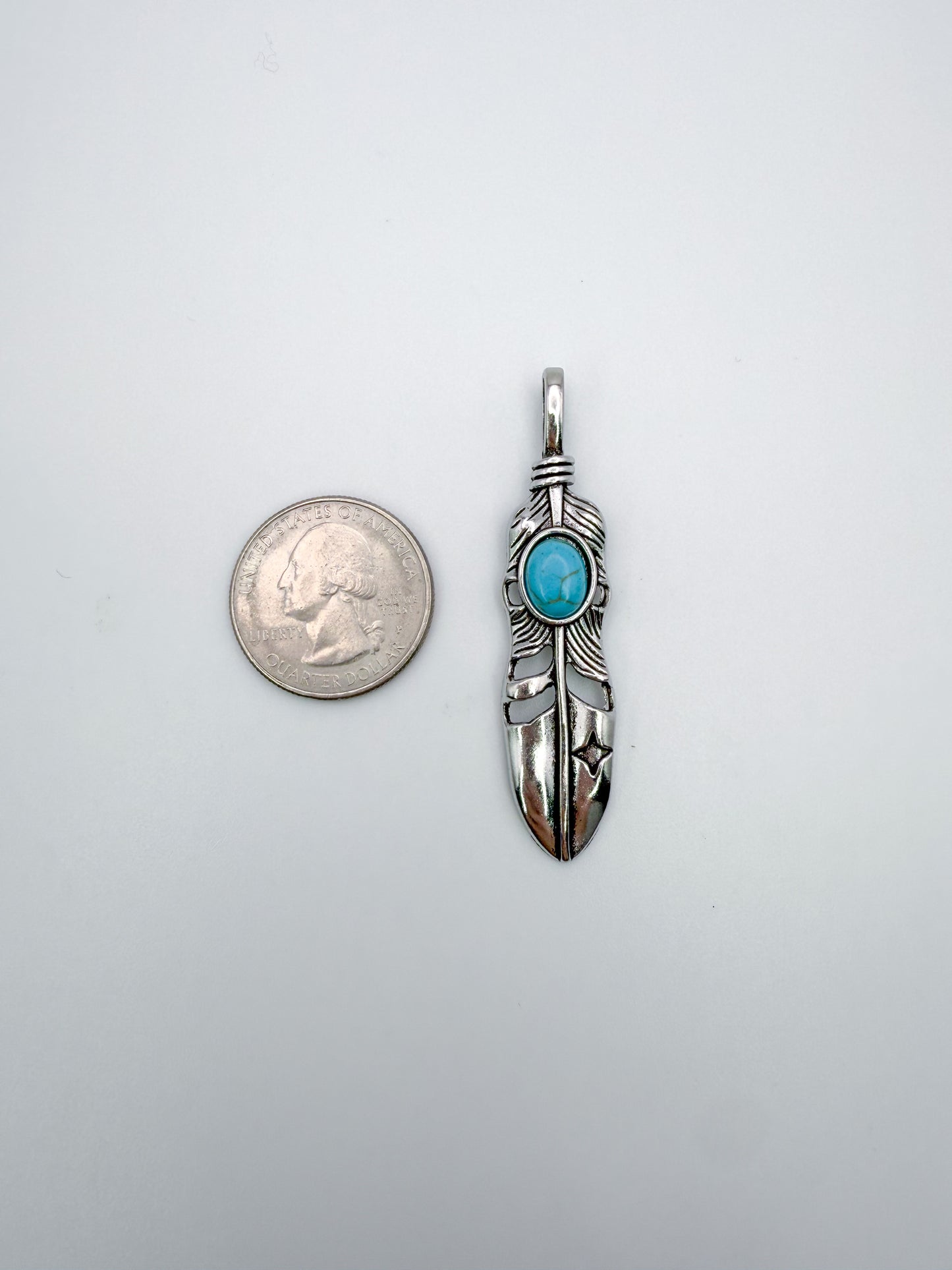 Silver Feather Pendant with Turquoise Stone in Center