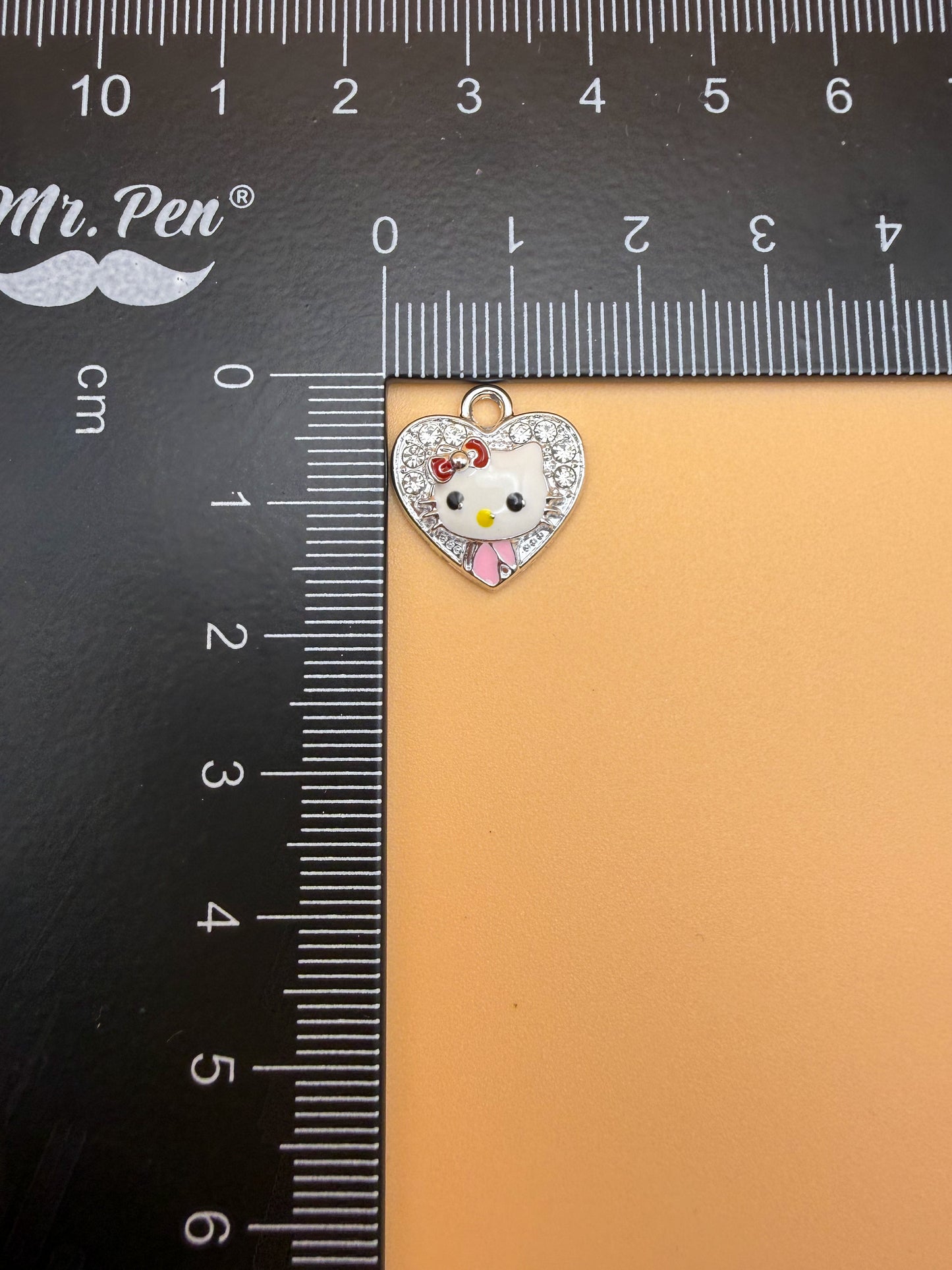 Variety of Gold & Silver Hello Kitty Metal Charms