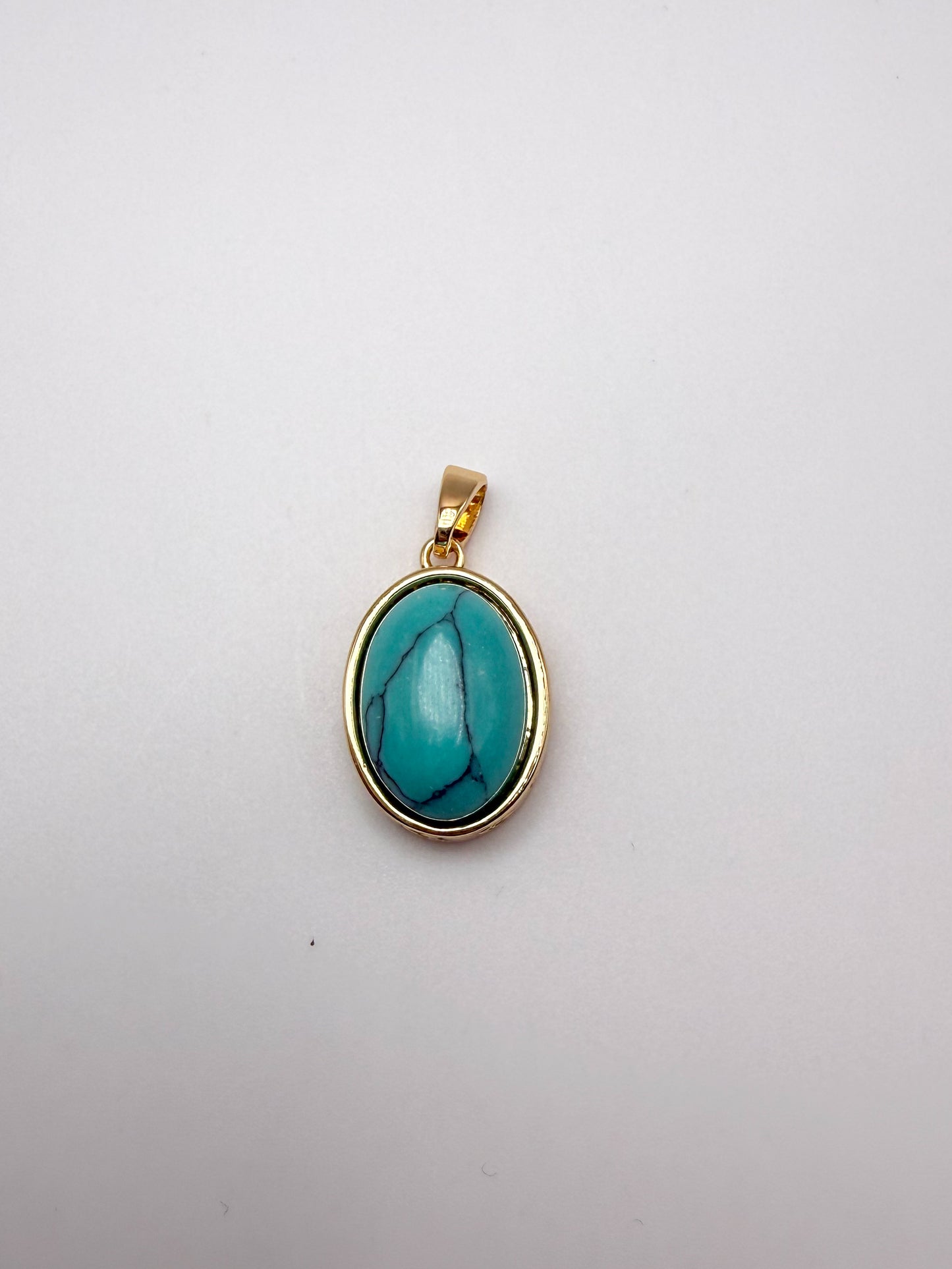 Gold Clover Design Cased Turquoise Oval Charm Pendant