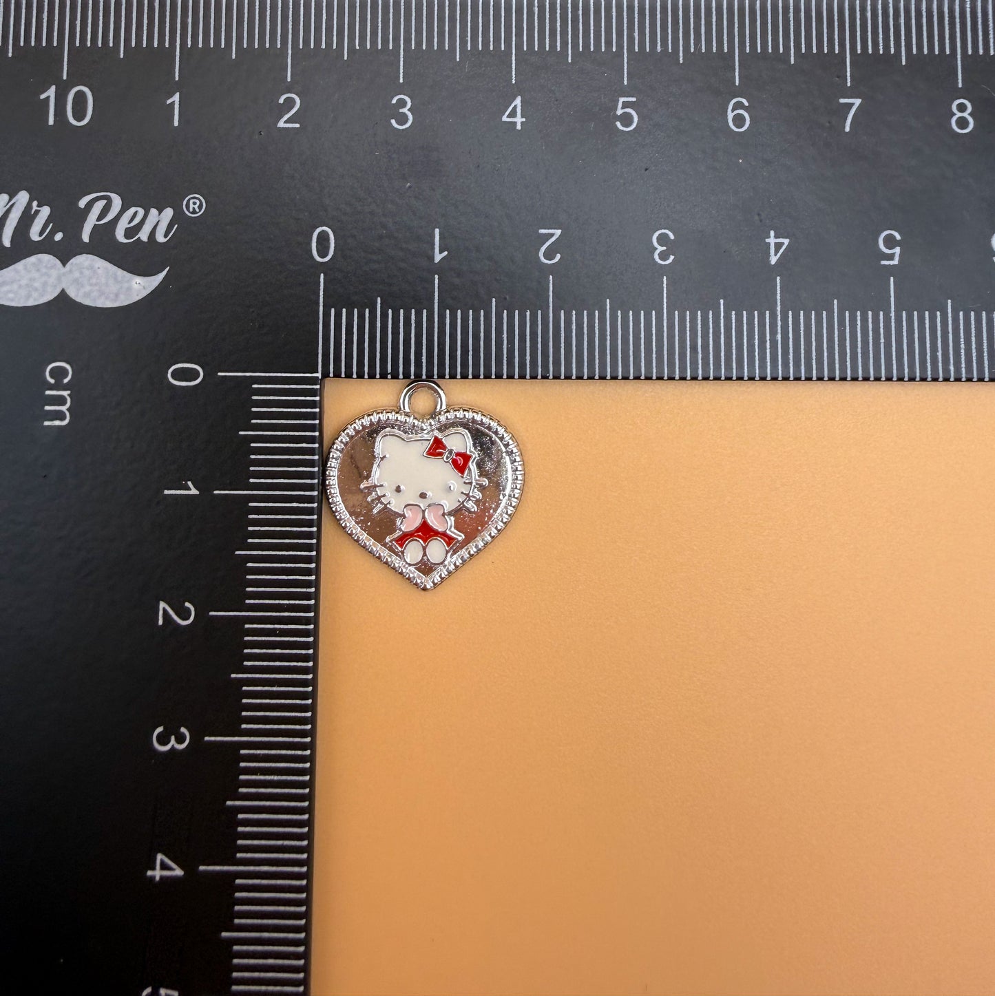 Variety of Gold & Silver Hello Kitty Metal Charms