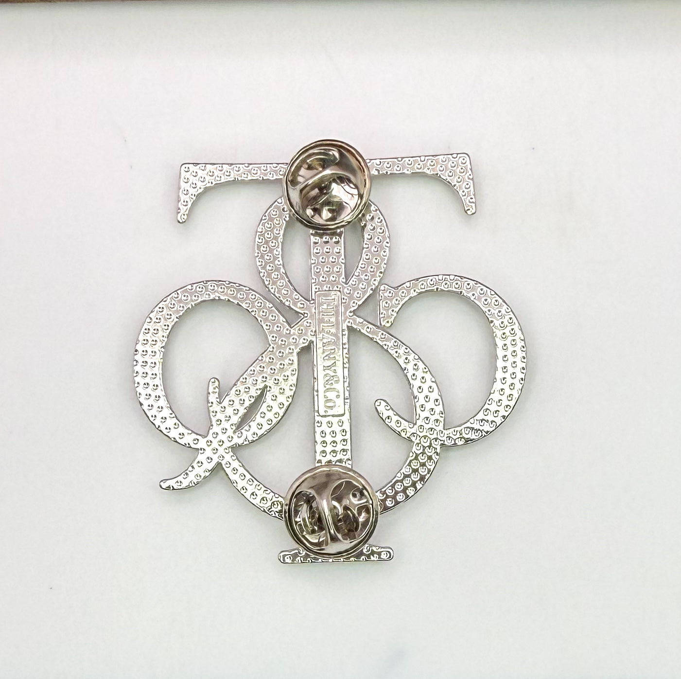 Tiff n Co. Brooches-Silver or Gold