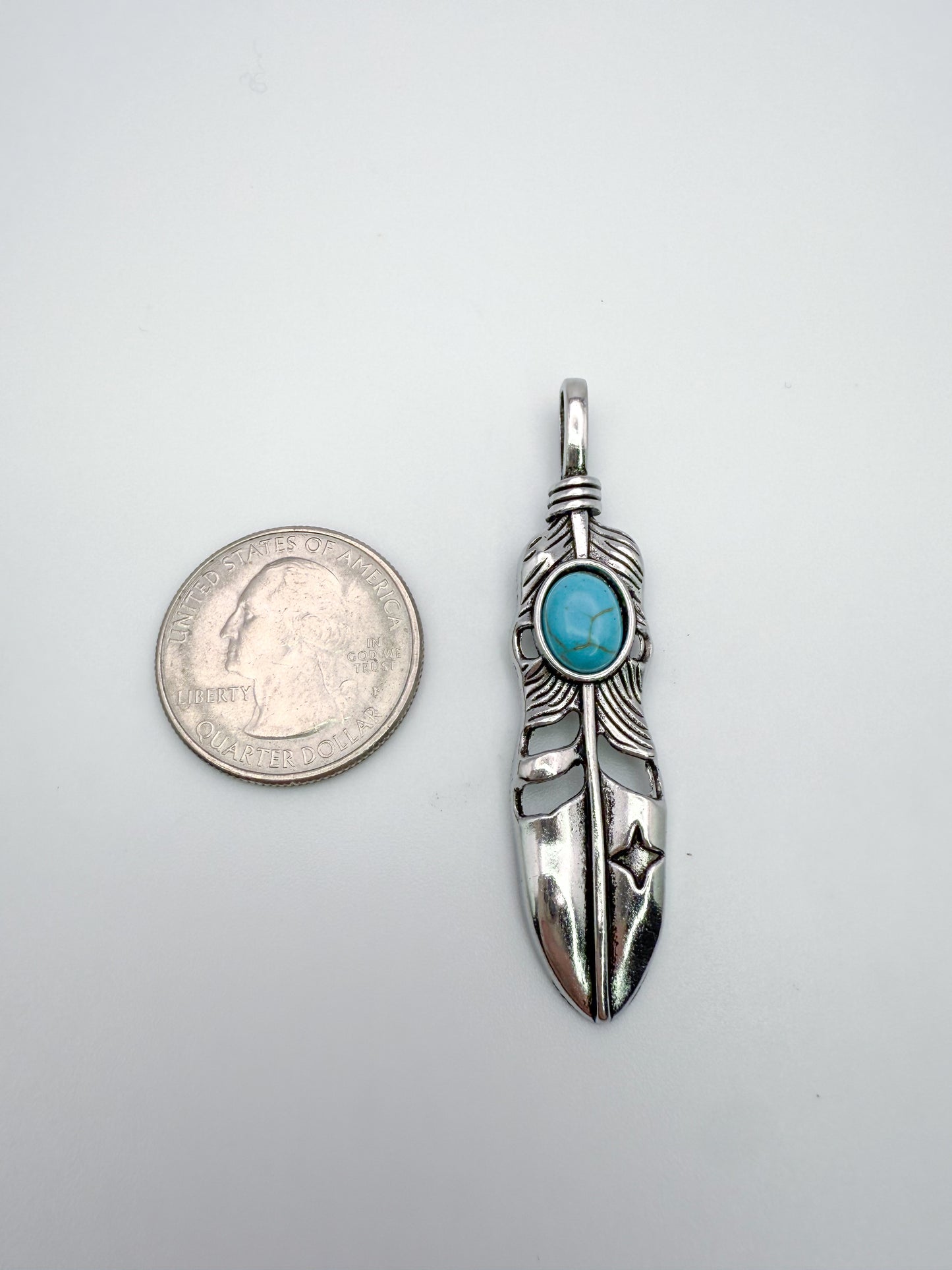 Silver Feather Pendant with Turquoise Stone in Center