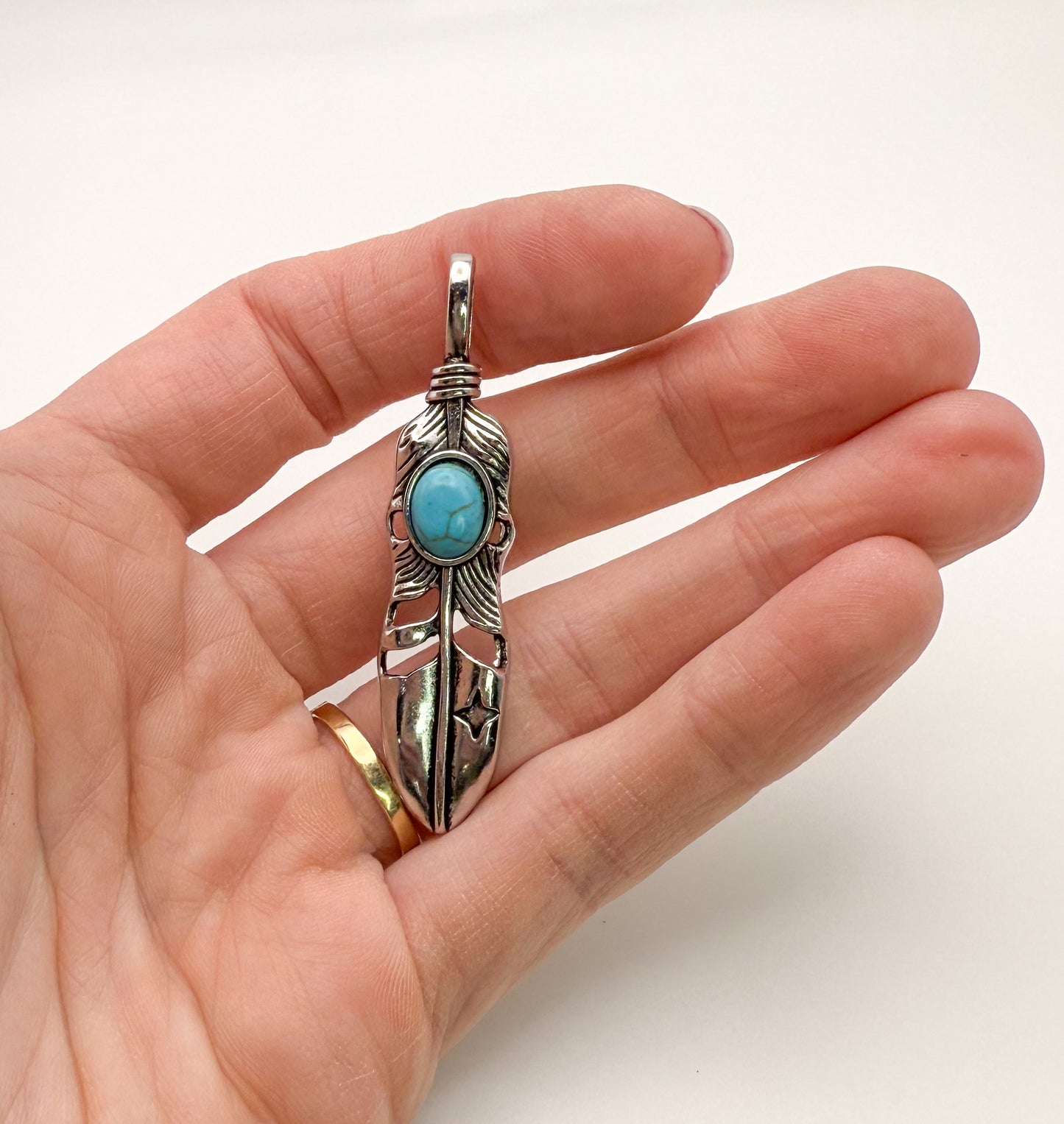 Silver Feather Pendant with Turquoise Stone in Center