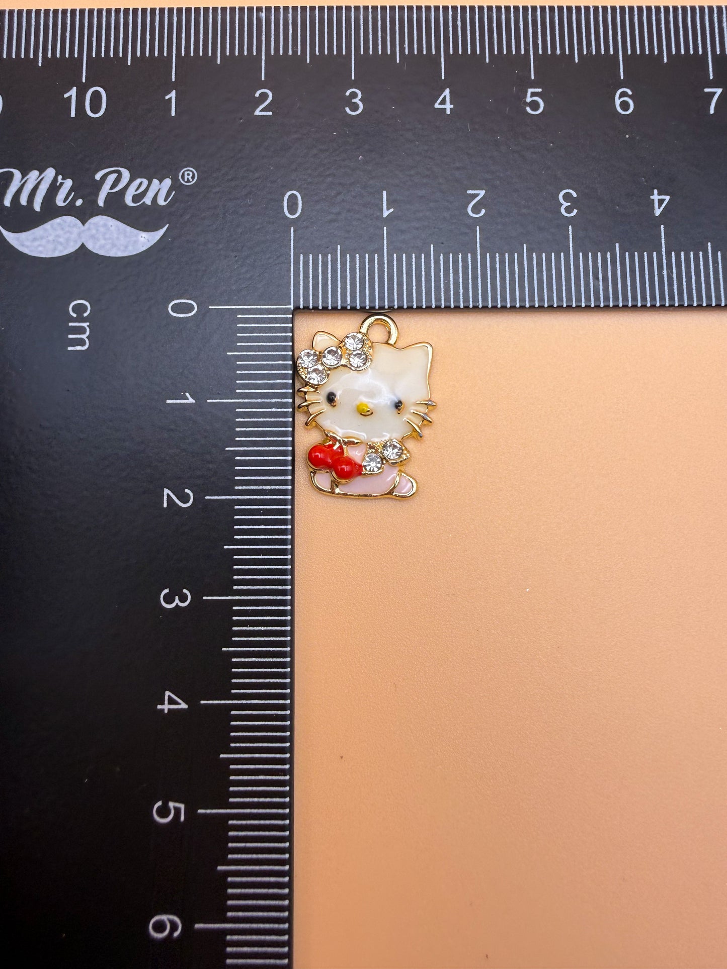 Variety of Gold & Silver Hello Kitty Metal Charms